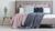 cama con 2 mantas rosada y gris marca mashini
